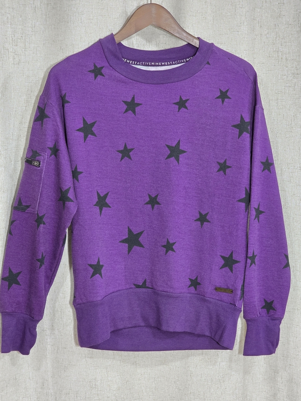 Nine West Purple Sweatshirt with Black Star Accents